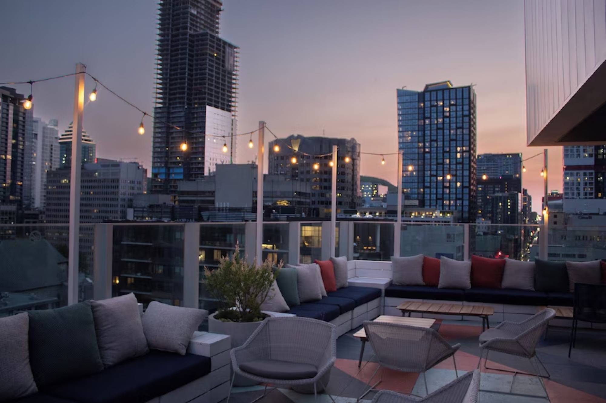 Hotel Monville rooftop terrace at dusk